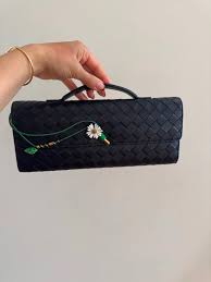 Bottega Andiamo Clutch with daisy flower closure